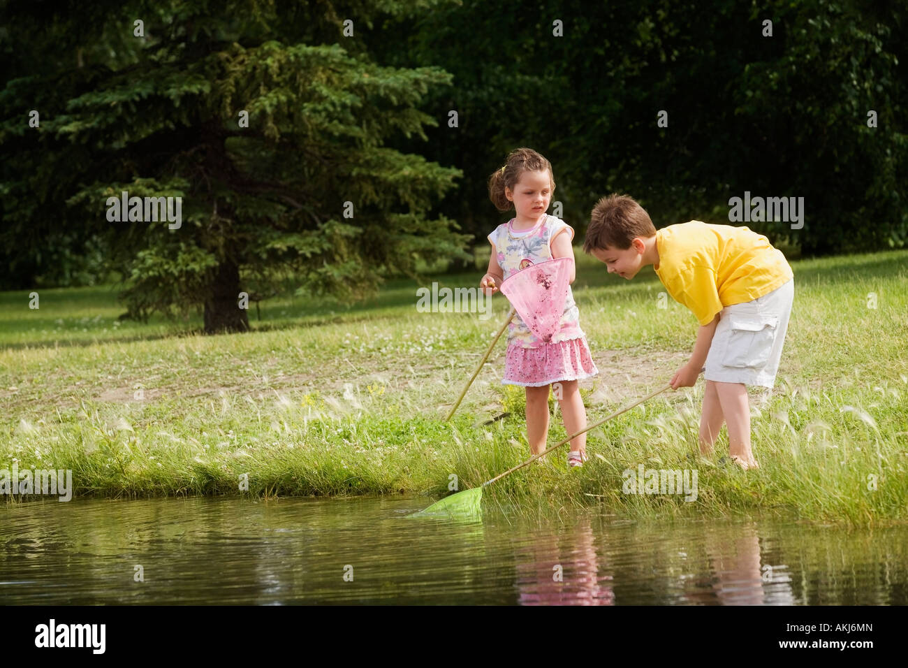 Children with fishing nets Stock Photo