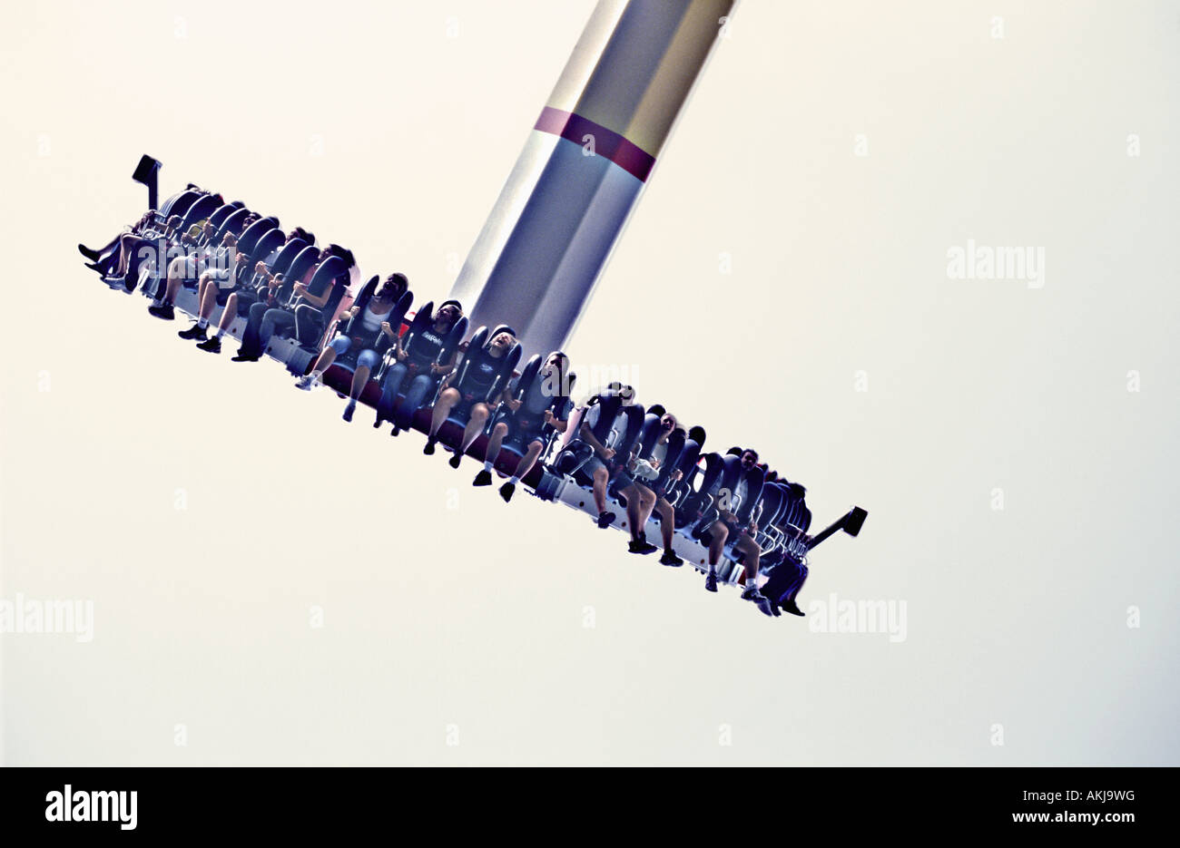 People enjoying an amusement park ride Stock Photo - Alamy