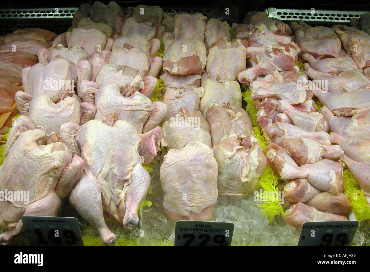 Fresh chicken on display in a farmer s market store Stock Photo Alamy