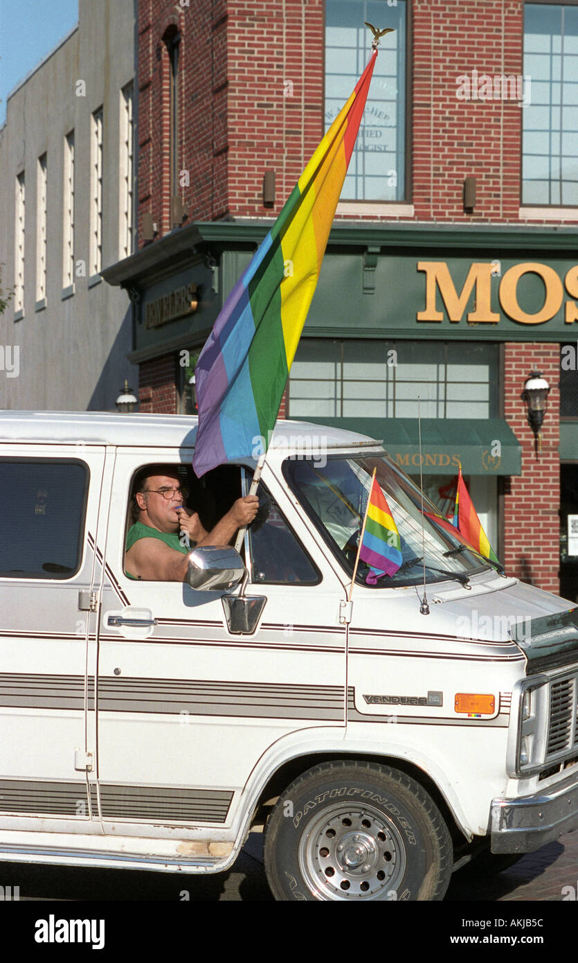 Van with gay males fly the gay flag during a gay pride day gathering Stock  Photo - Alamy