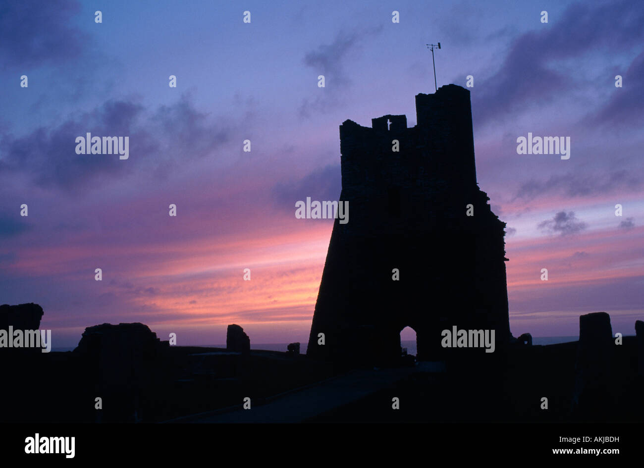 Silhouette of Aberystwyth Castle, Wales, UK, at Sunset Stock Photo