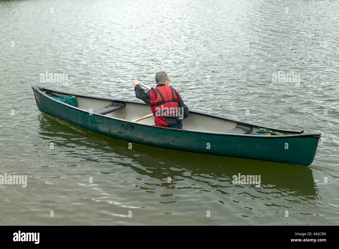 Boy in canoe or kayak, lake, East Yorkshire Stock Photo Alamy