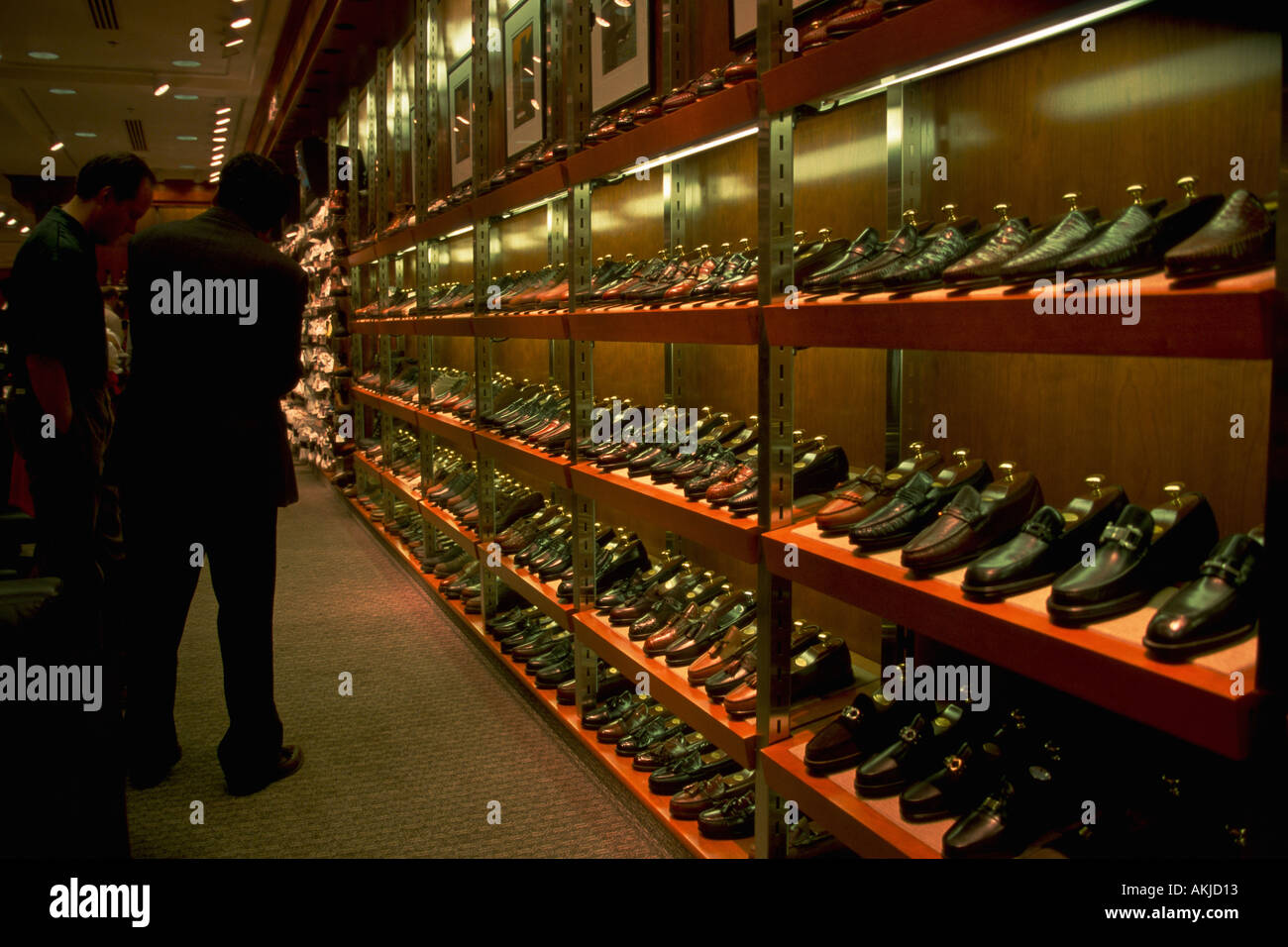 Salesman and customer in men s shoe department Nordstorm Clothing Store