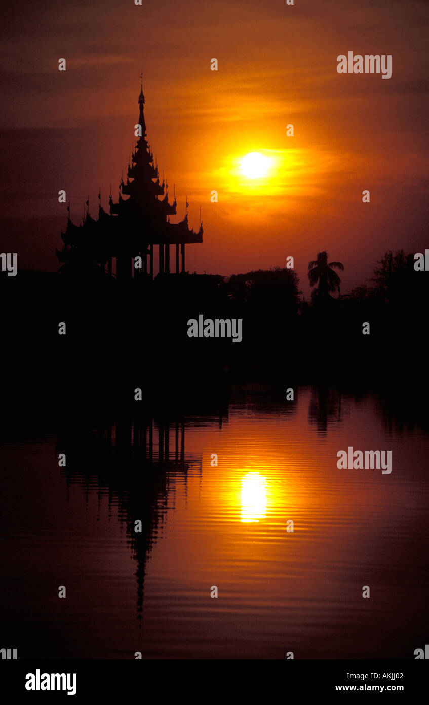 Sunset over Ornate Pagoda in Mandalay, Burma Stock Photo