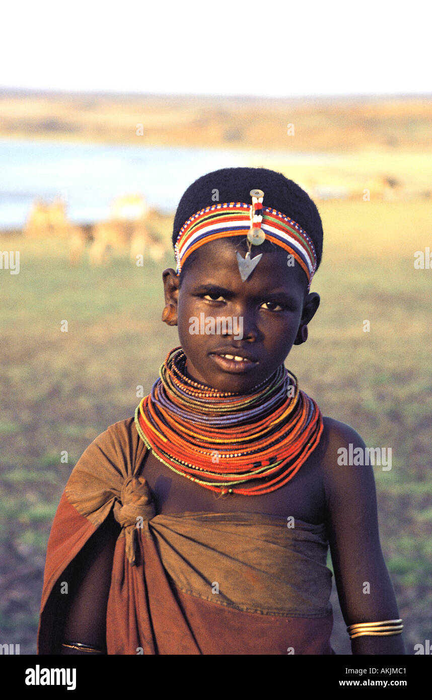 Young El Molo girl or teenager wearing traditional coloured beads and headbands similar to Samburu people Stock Photo