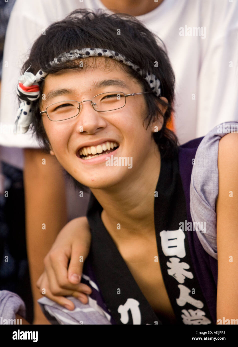 A smiling drummer boy's at a Bon Odori festival, Malaysia Stock Photo