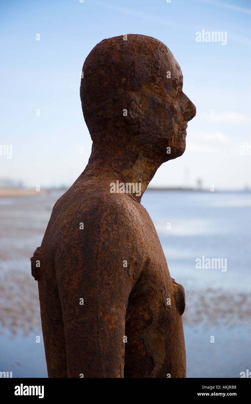 Antony Gormley statue at Crosby beach Liverpool Merseyside UK Stock
