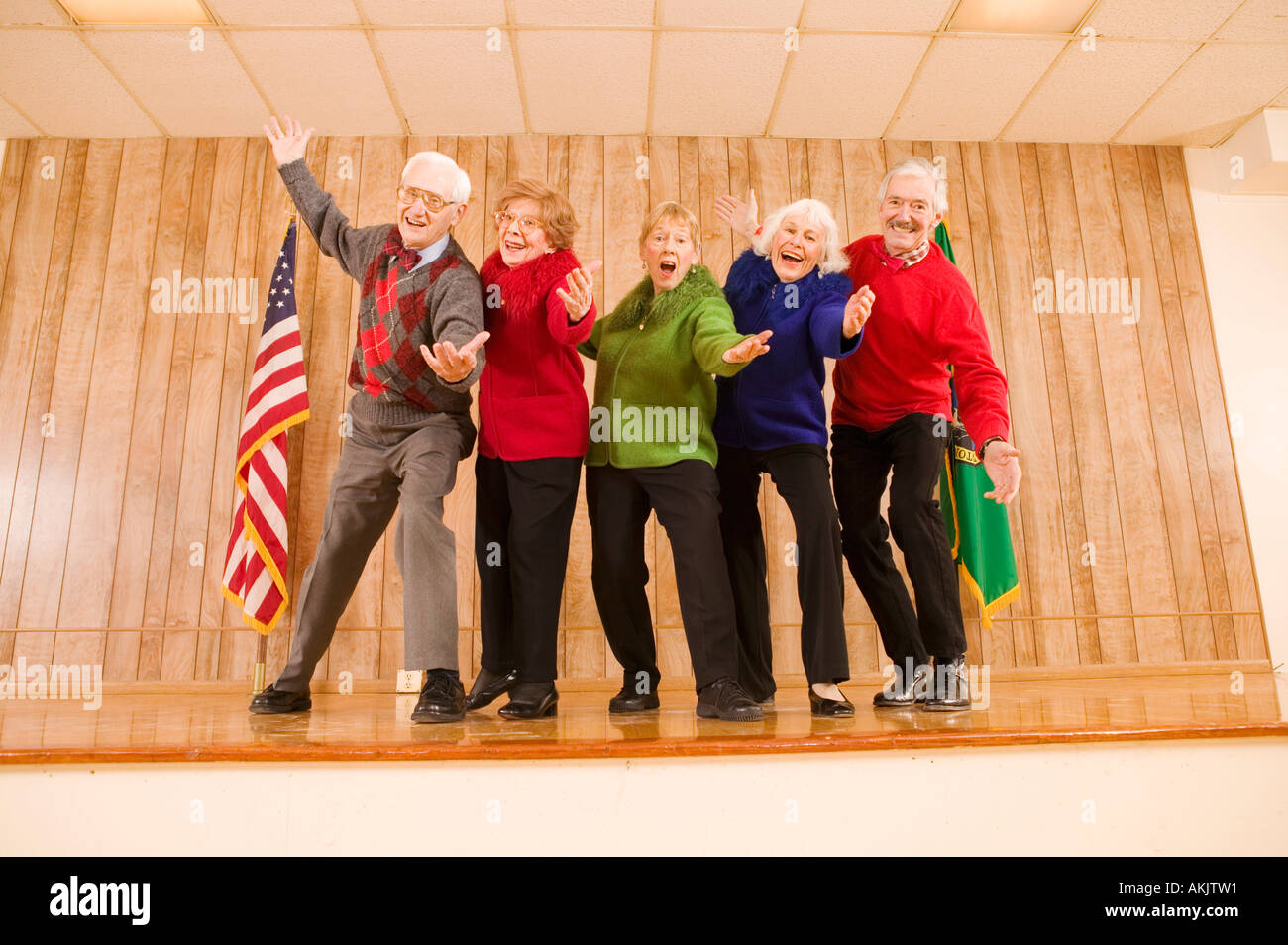 Elderly people performing song and dance Stock Photo