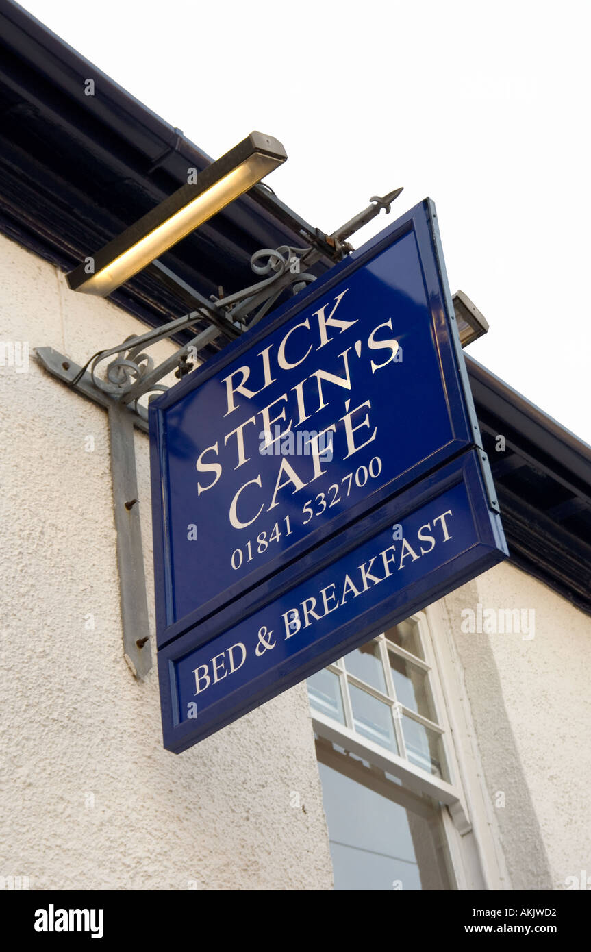 The hanging sign outside Rick Stein's Cafe, one of his establishments in Padstow, Cornwall, England Stock Photo