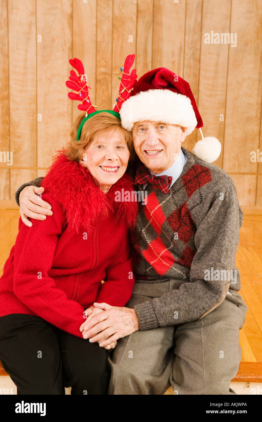 Portrait of elderly couple at Christmastime Stock Photo