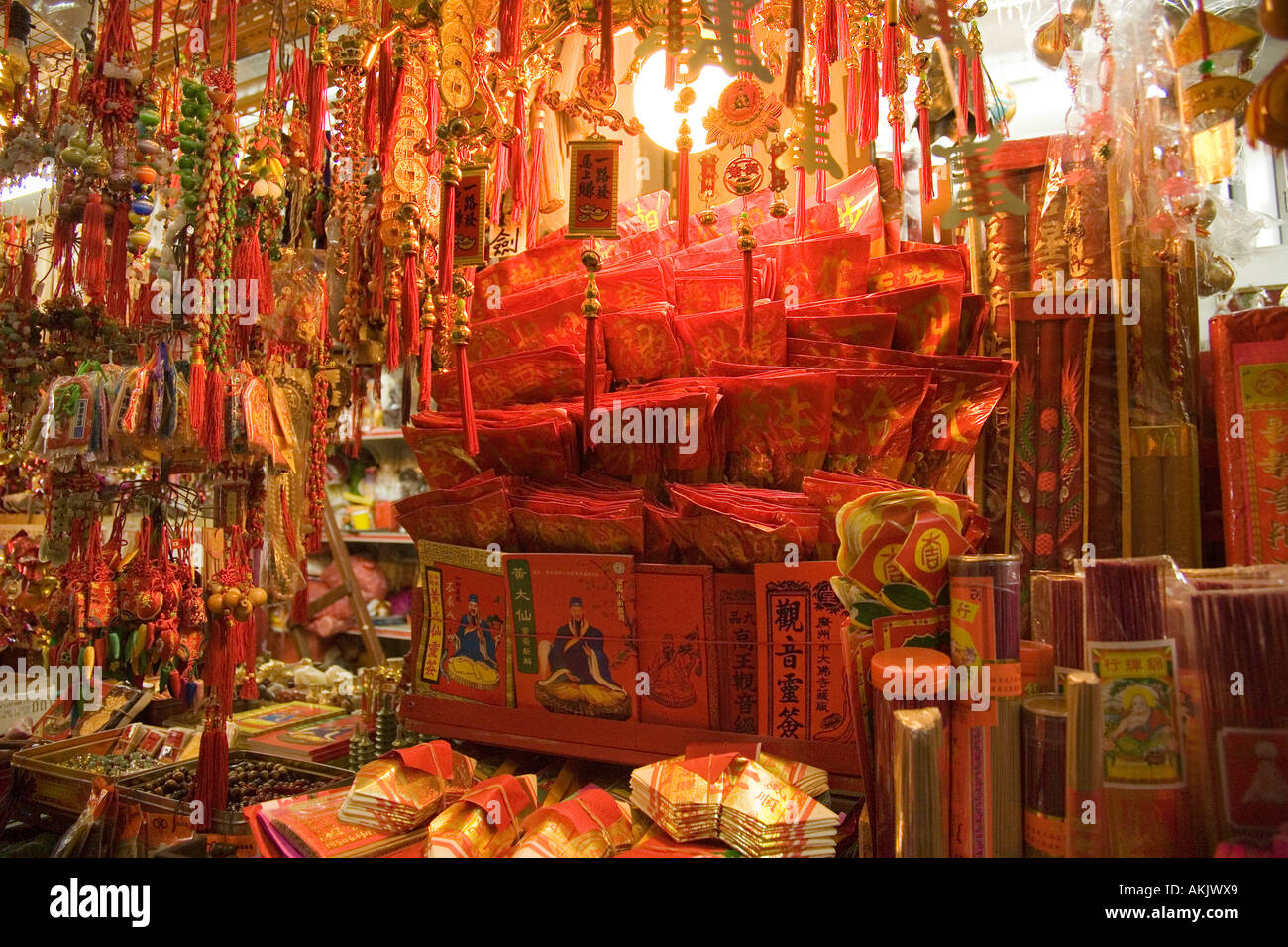 Shelves of religious offerings in Hong Kong shop Stock Photo Alamy