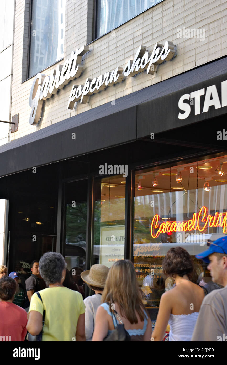 STREET SCENE Chicago Illinois Michigan Avenue pedestrians pass Garrett