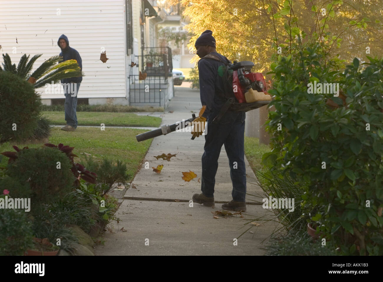 A Gardener Blows Leaves From A Yard Off The Bayou St John New