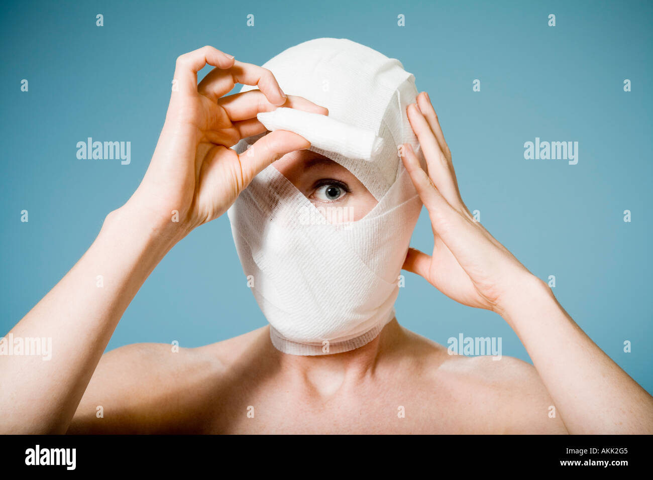 Woman head wrapped in bandage hi-res stock photography and images - Alamy