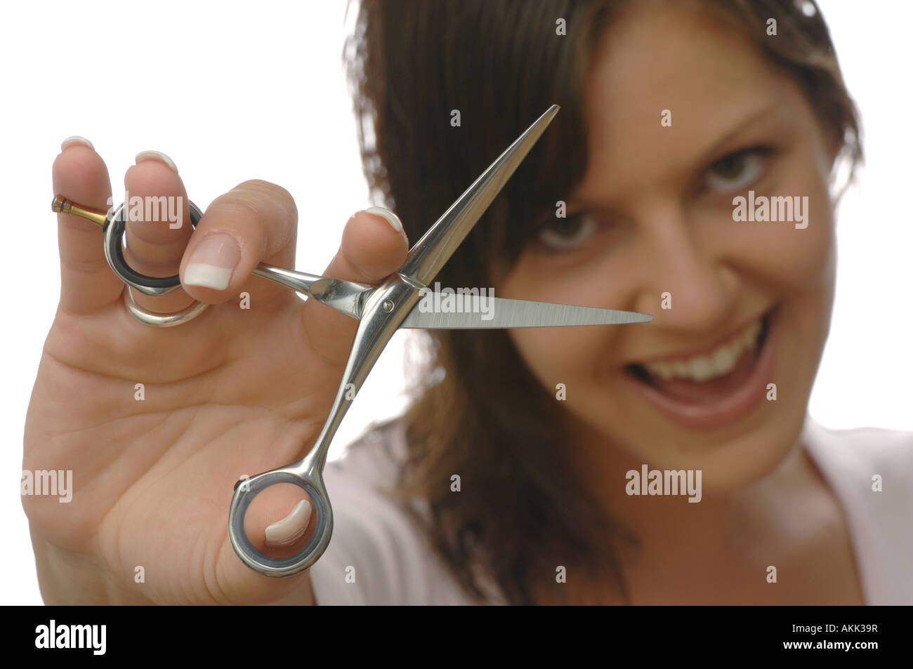 hairdresser holding a scissors Stock Photo