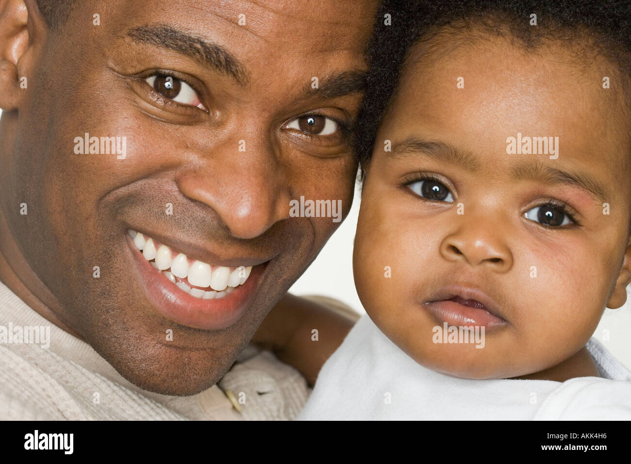 Father and daughter posing for the camera Stock Photo Alamy