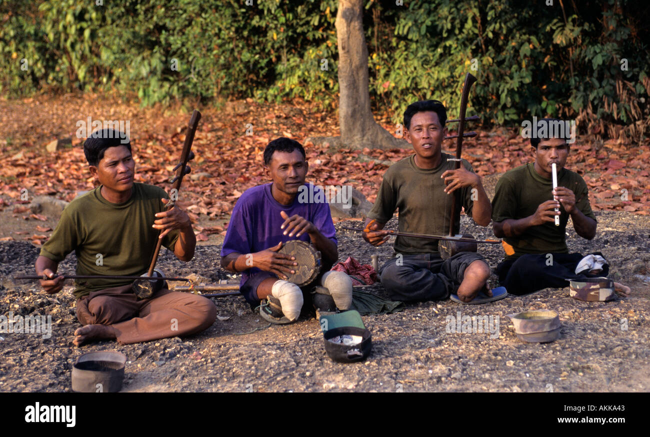 Musicians having lost limbs to land mines playing for tourists,  Angkor Cambodia Stock Photo