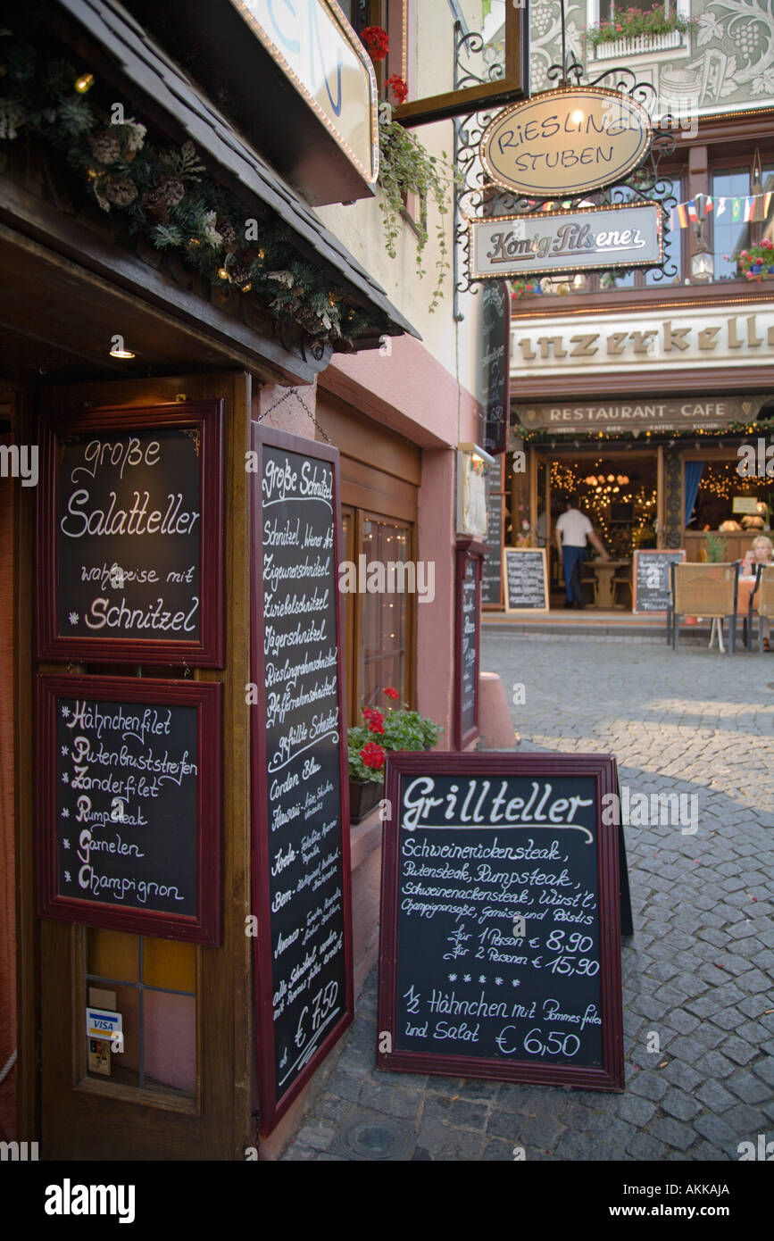 Restaurant menu boards Drosselgasse Rudesheim Rheingau Germany Stock Photo