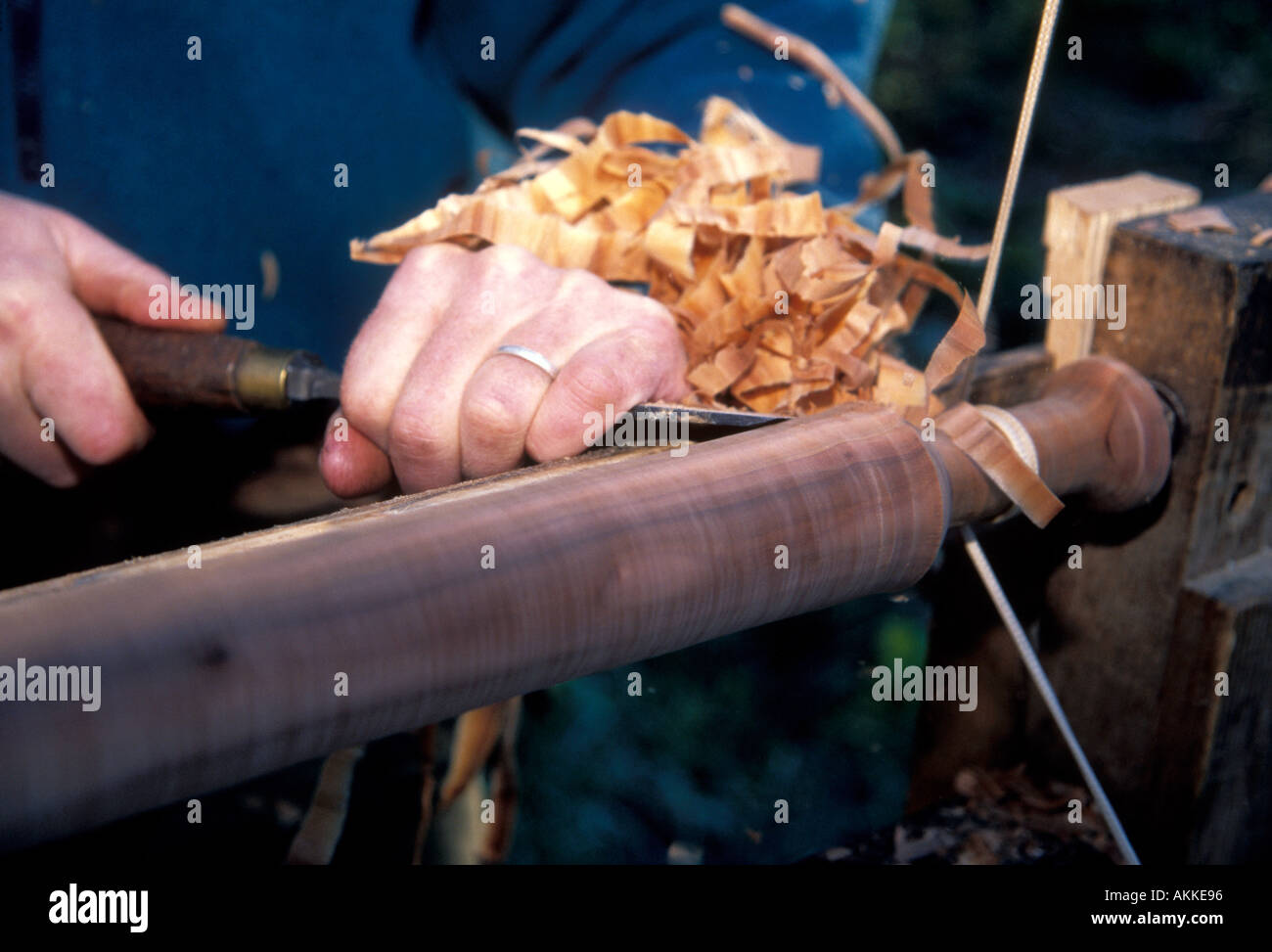 Mike Abbott a coppice craftsman working with his pole lathe which is powered by his foot Stock