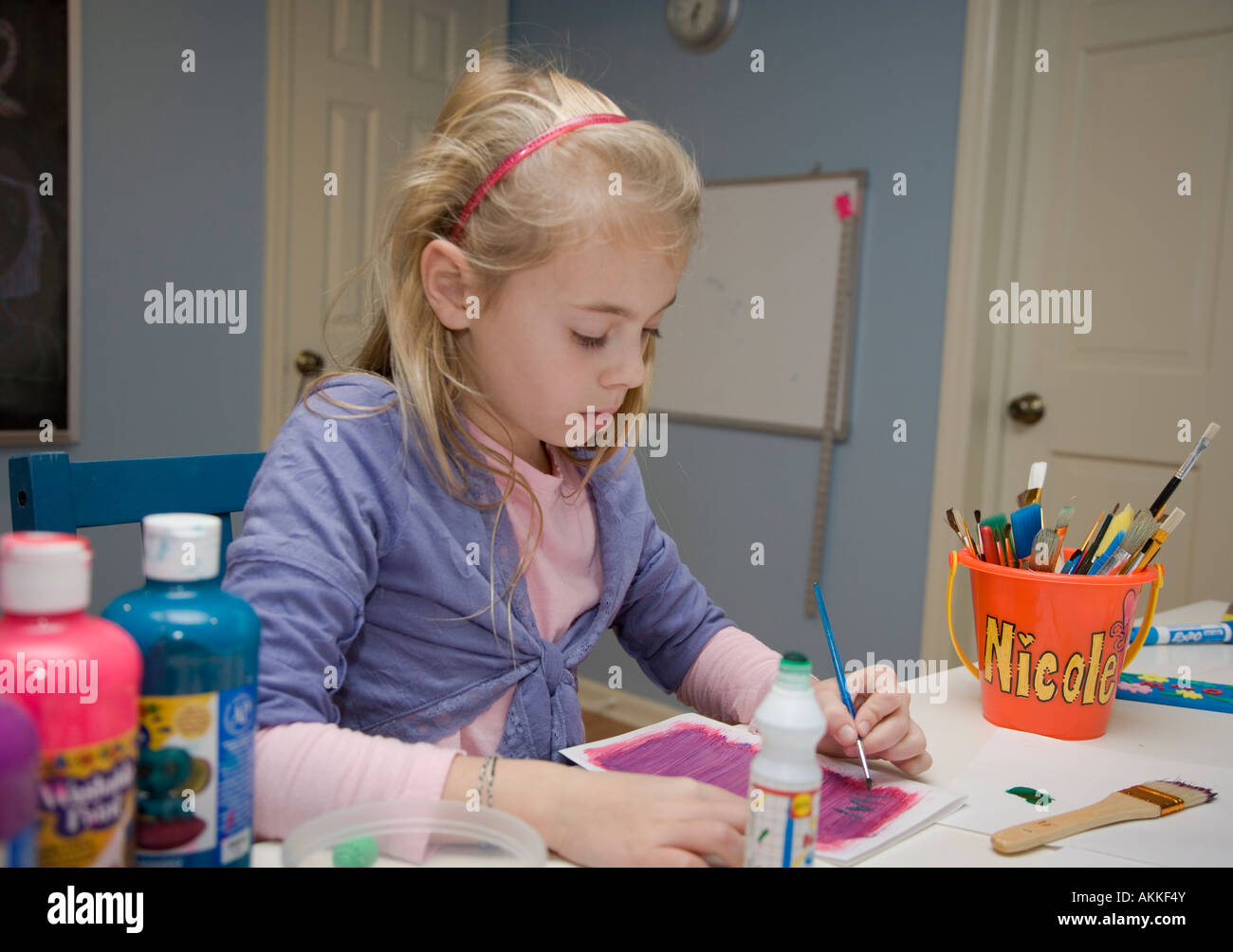 Child painting a picture Stock Photo Alamy