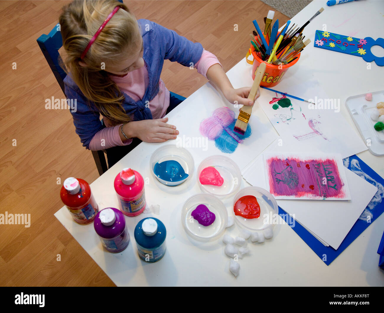 Child painting a picture Stock Photo Alamy