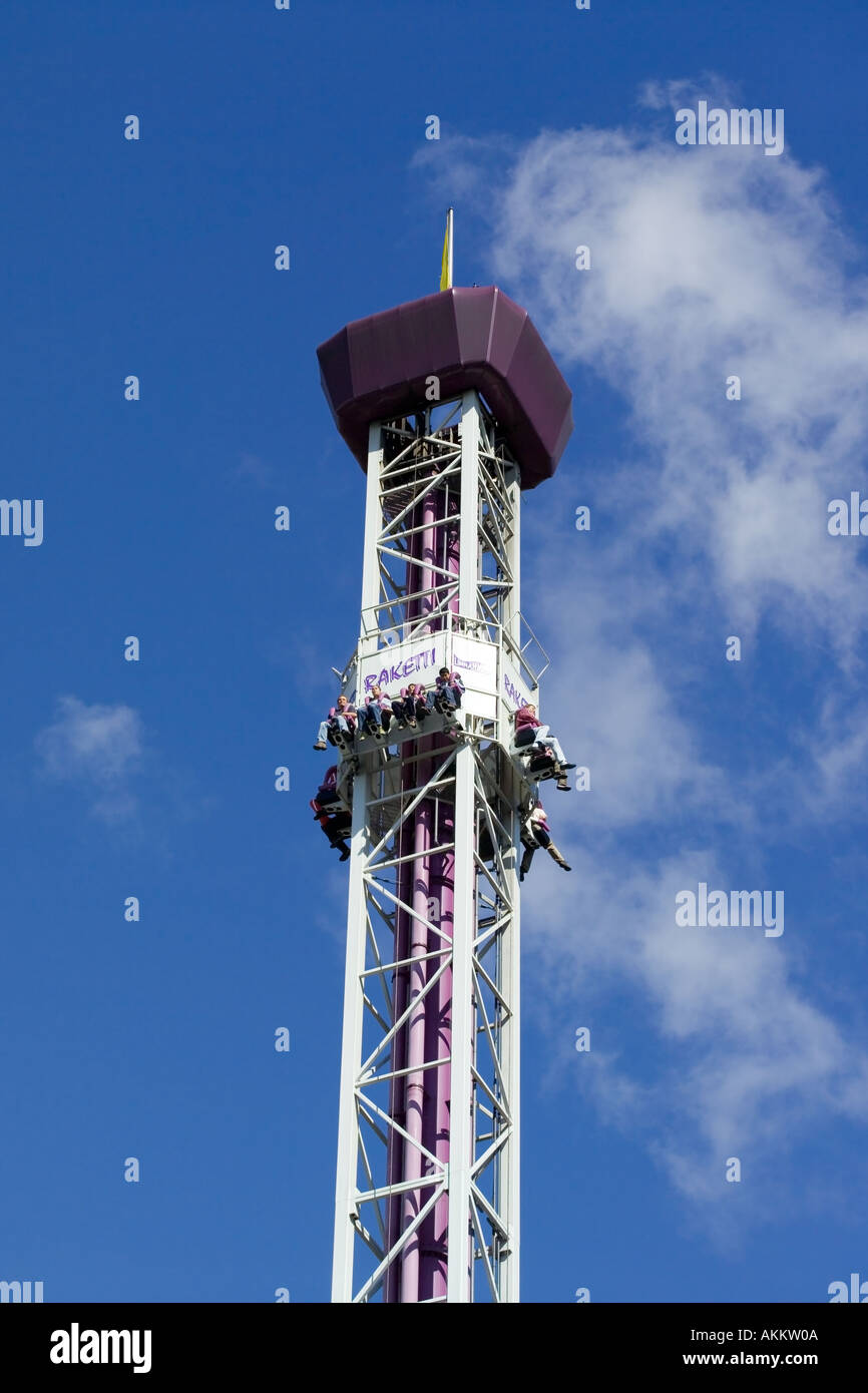 People in an amusement park ride Stock Photo - Alamy