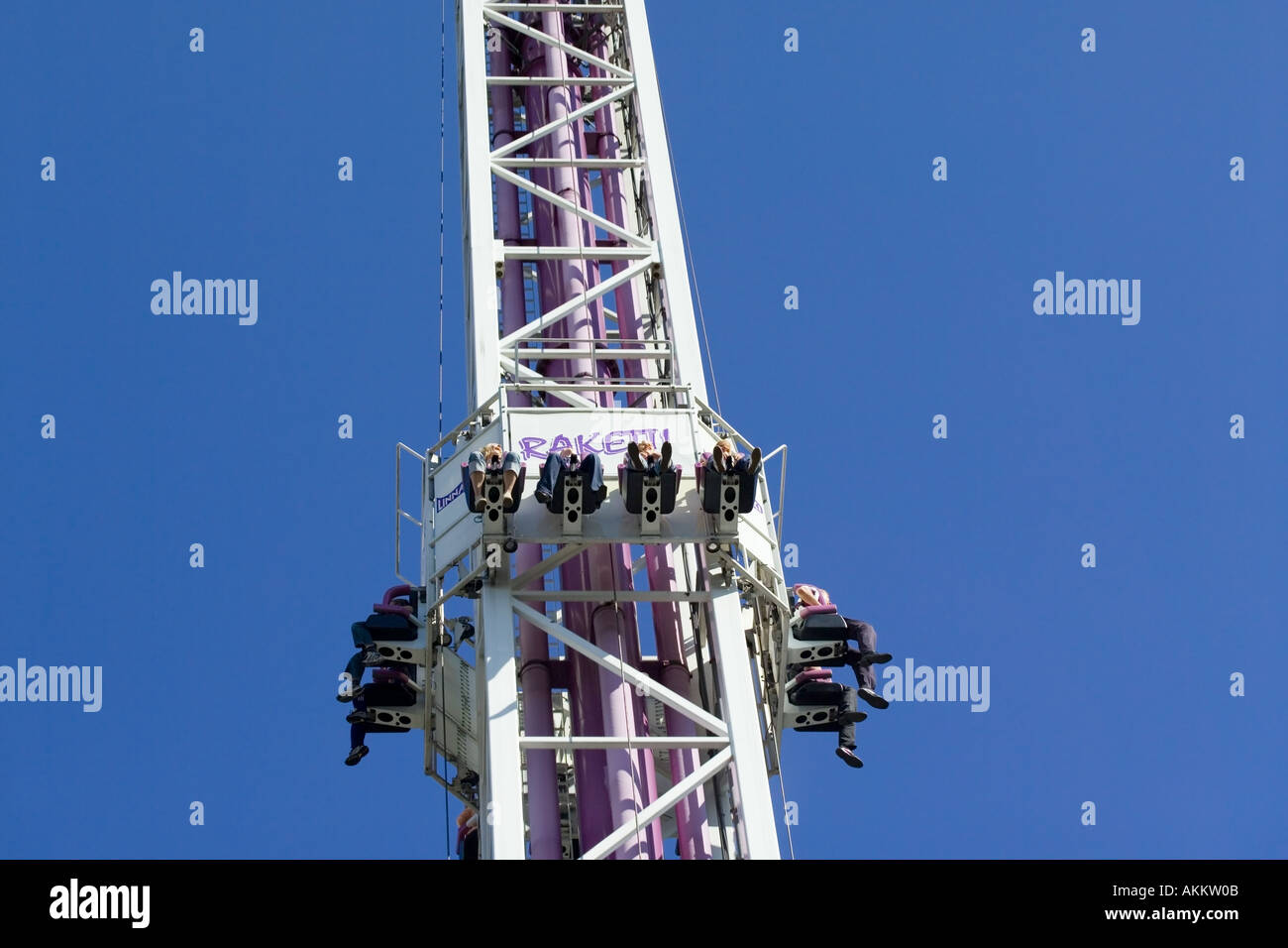 People in an amusement park ride Stock Photo - Alamy