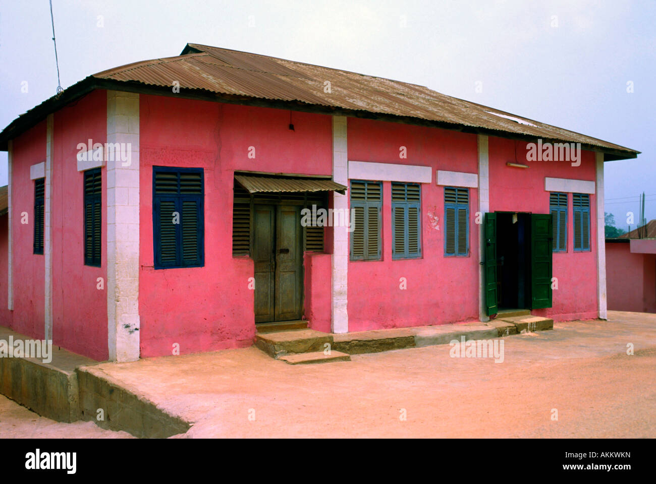 A brightly painted house in Kumasi Ghana Stock Photo