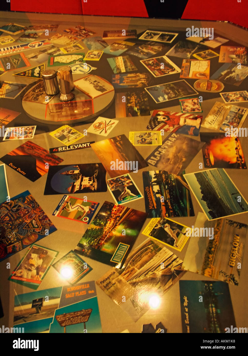 Travel memorabilia table at Sparkys Diner YWAM Restaurant Chennai Madras India Stock Photo