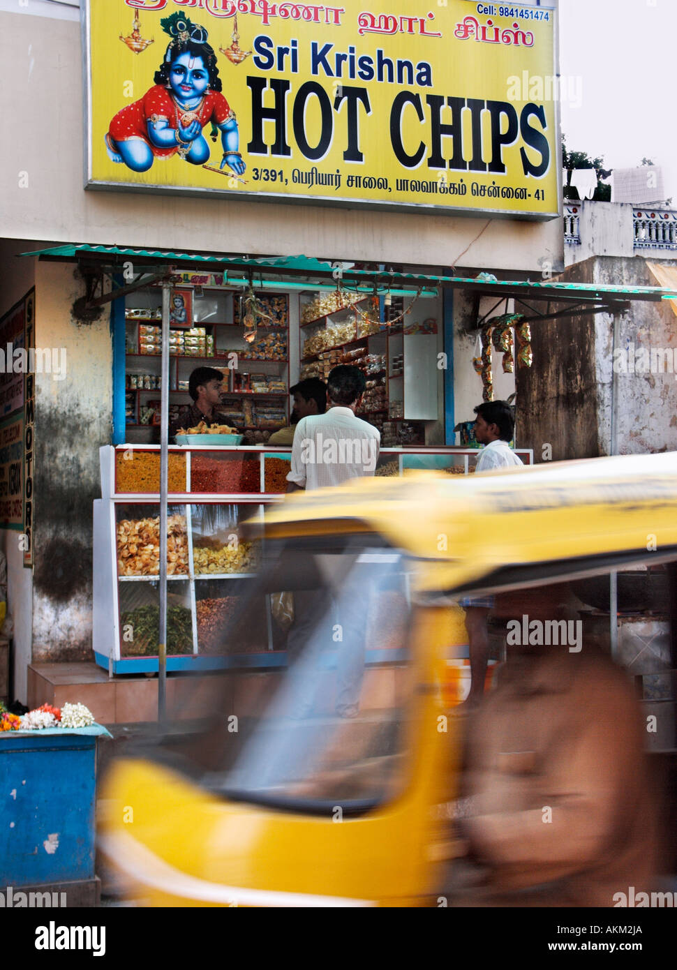 Traffic passing in front of Sri Krishna Hot Chips shop Chennai Madras