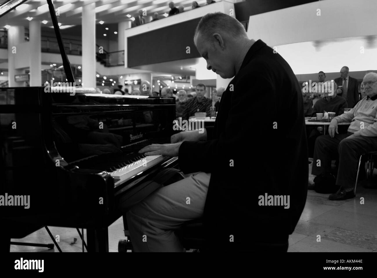 Musician playing piano Stock Photo - Alamy