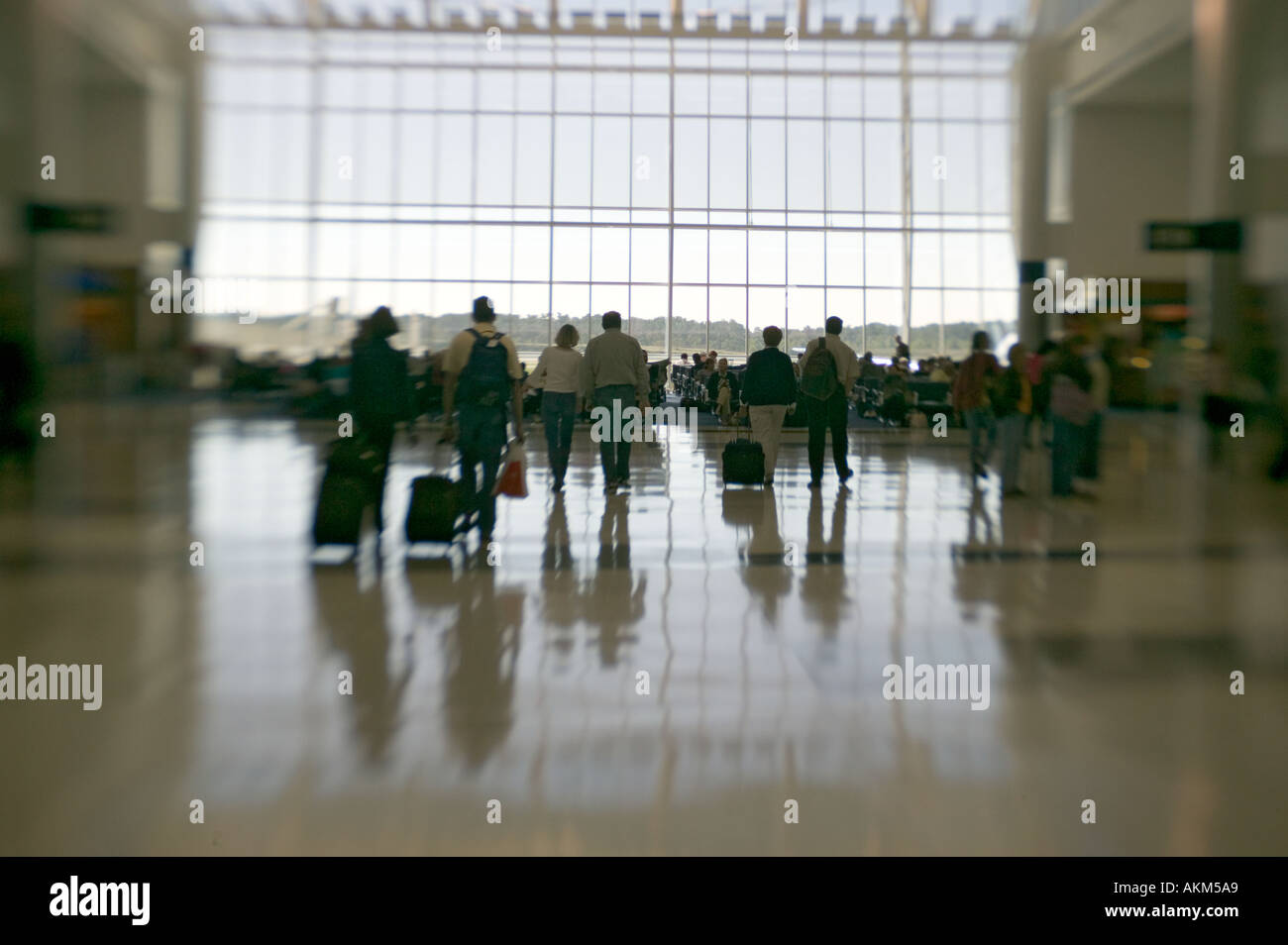Passenger silhouettes in George Bush International Airport Houston Texas Stock Photo