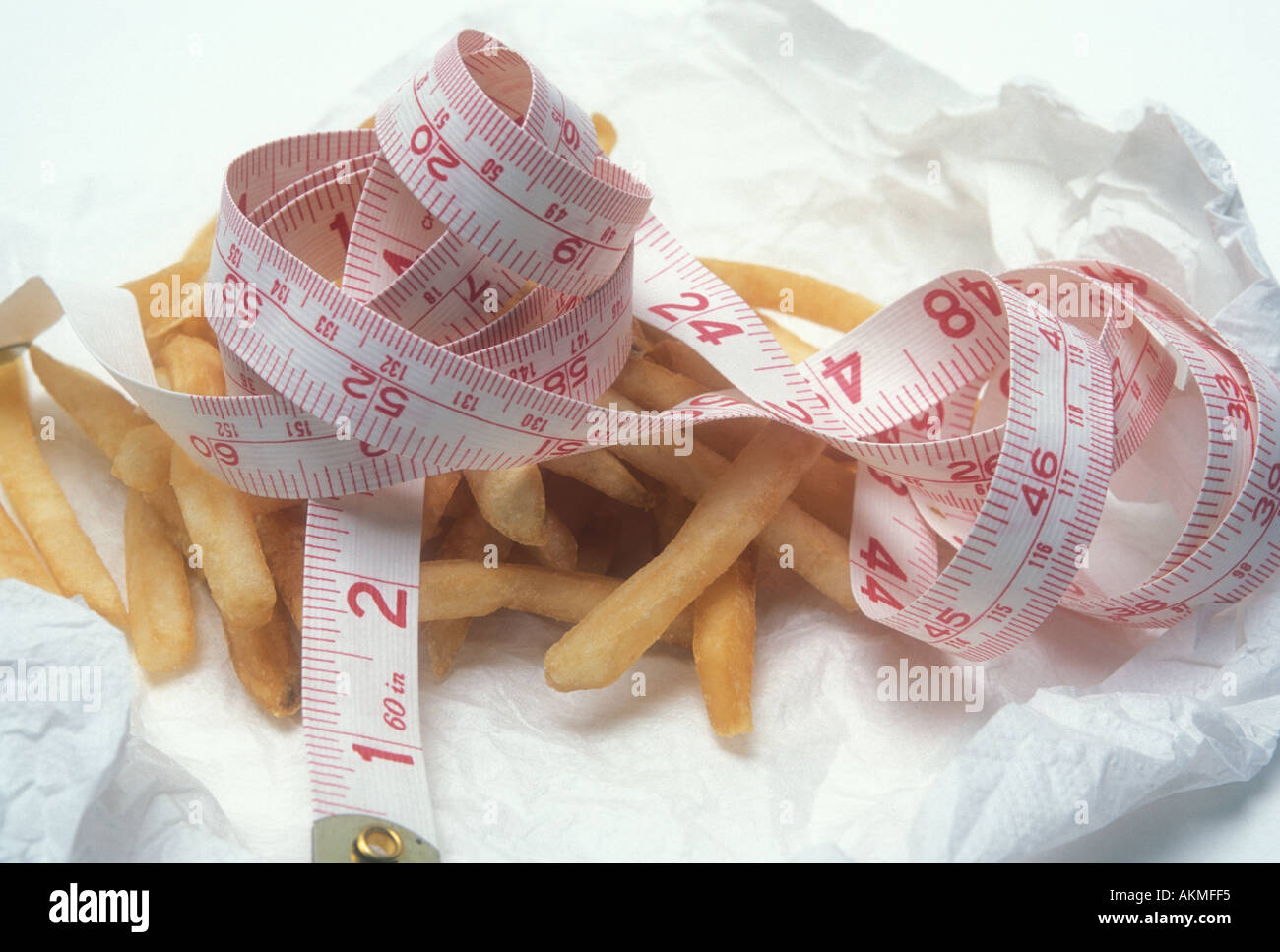 French Fries and Tape Measure Stock Photo - Alamy