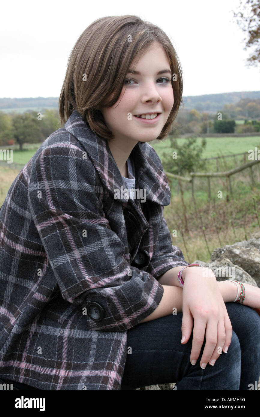 A environmental portrait of a thirteen year old girl in rural England. Stock Photo