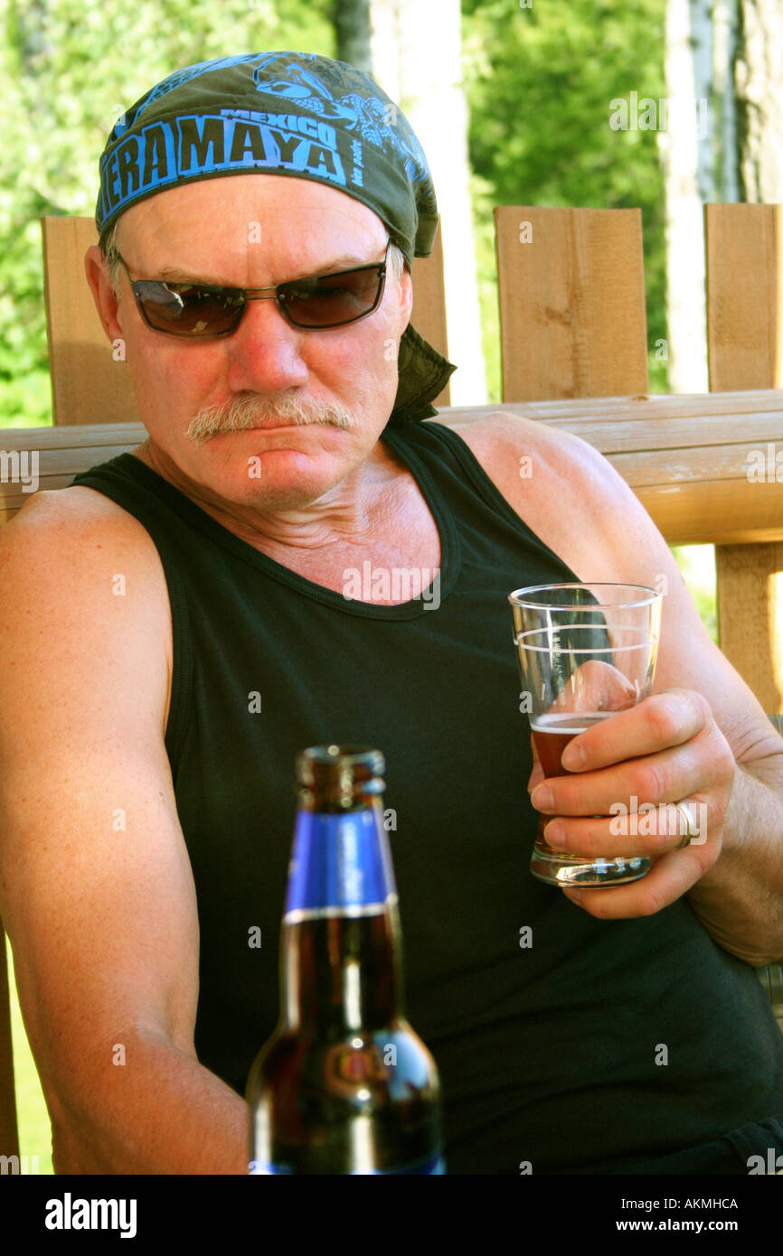 Tough Macho Beer Drinker In A Bar Stock Photo Alamy