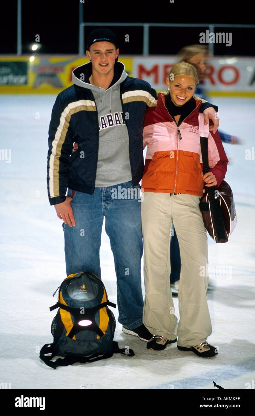 Germany Free time Portrait of two young persons on an ice skating rink  Stock Photo