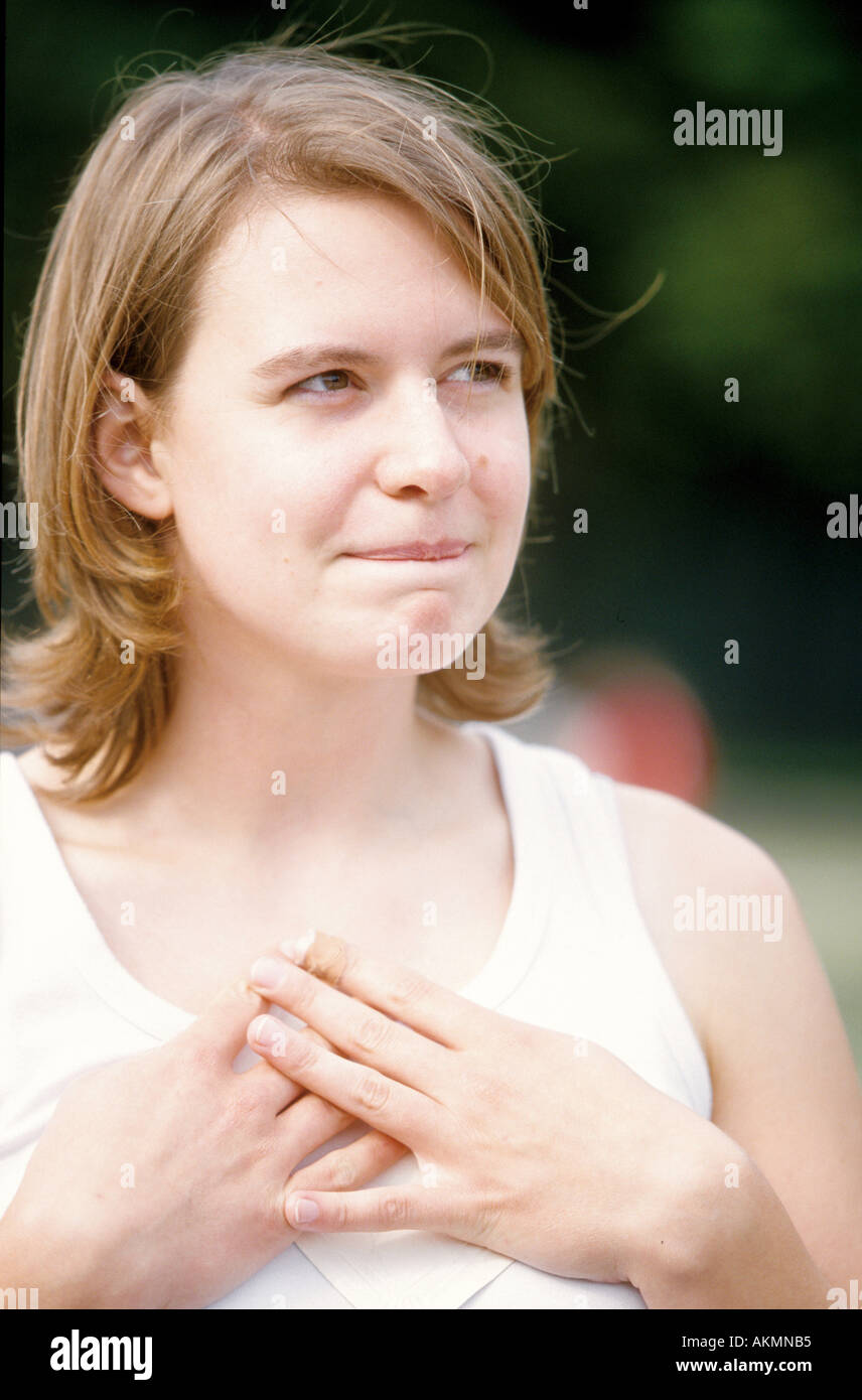 Germany Free time Portrait of a young woman she seems to be unsure  Stock Photo