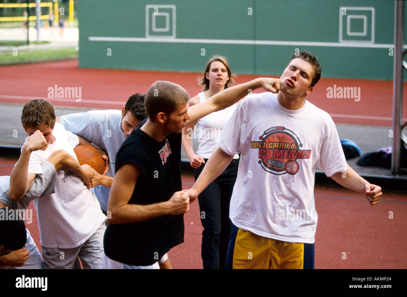Germany Free time Young men playing basketball confrontation  Stock Photo
