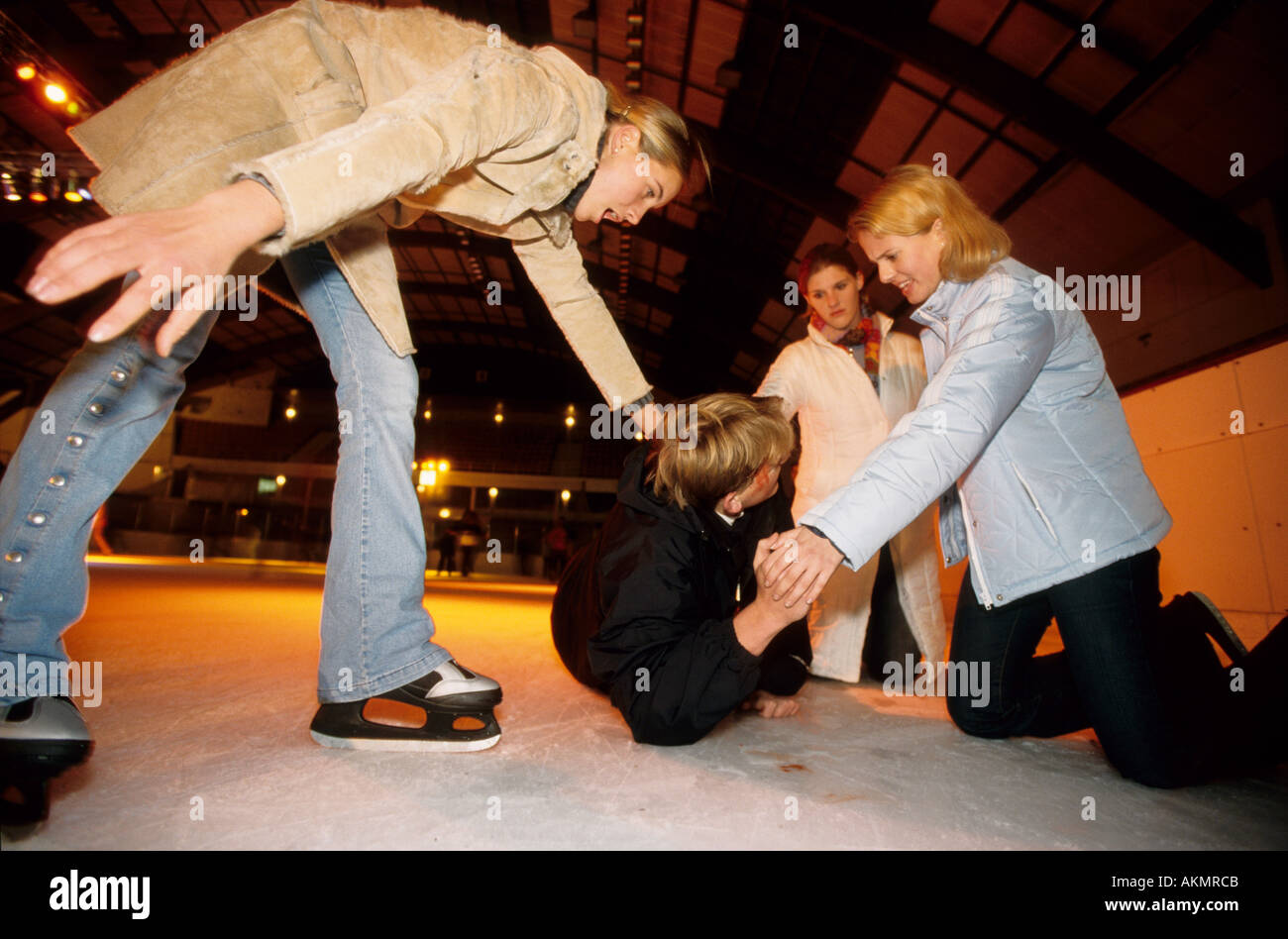 Germany Free time While skating in an ice skating rink a boy falled and