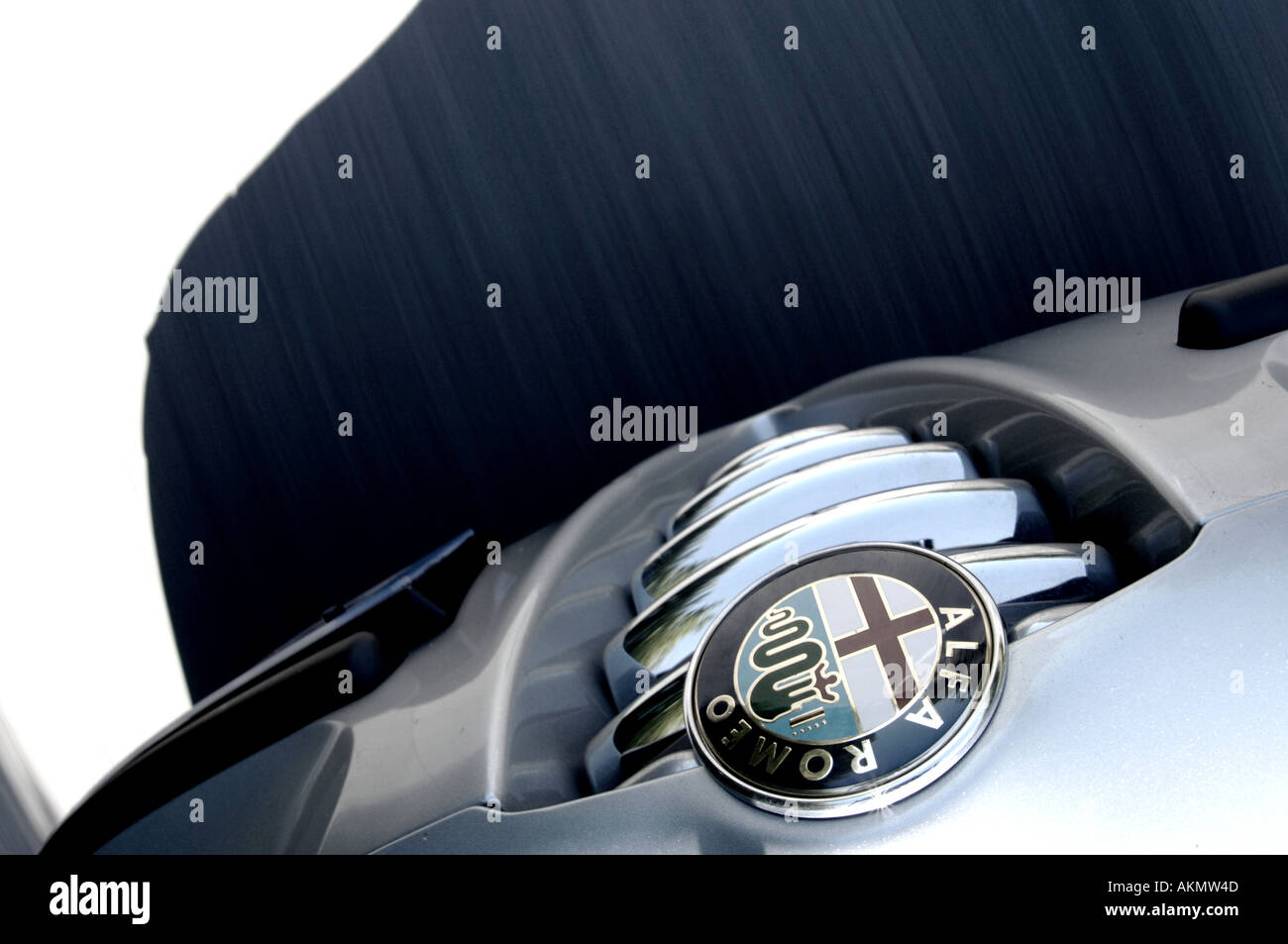 Alfa Romeo 147 badge and grill speeds along the road suction mount abstract Stock Photo