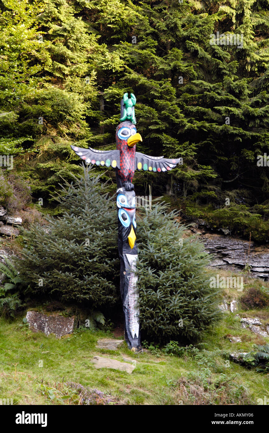 Carved wooden sculpture relating to Prince Madoc discovering North America in 1170 located at Cwmcarn Forest Drive South Wales Stock Photo