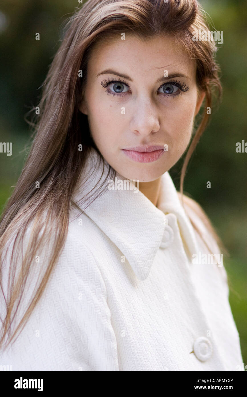 Portrait of girl wearing coat Stock Photo - Alamy