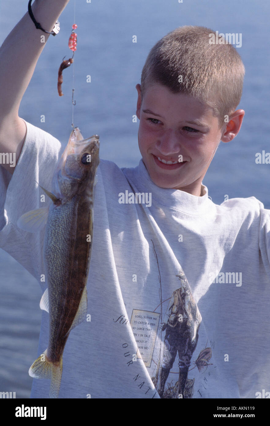 Boy with Walleye fish Stock Photo