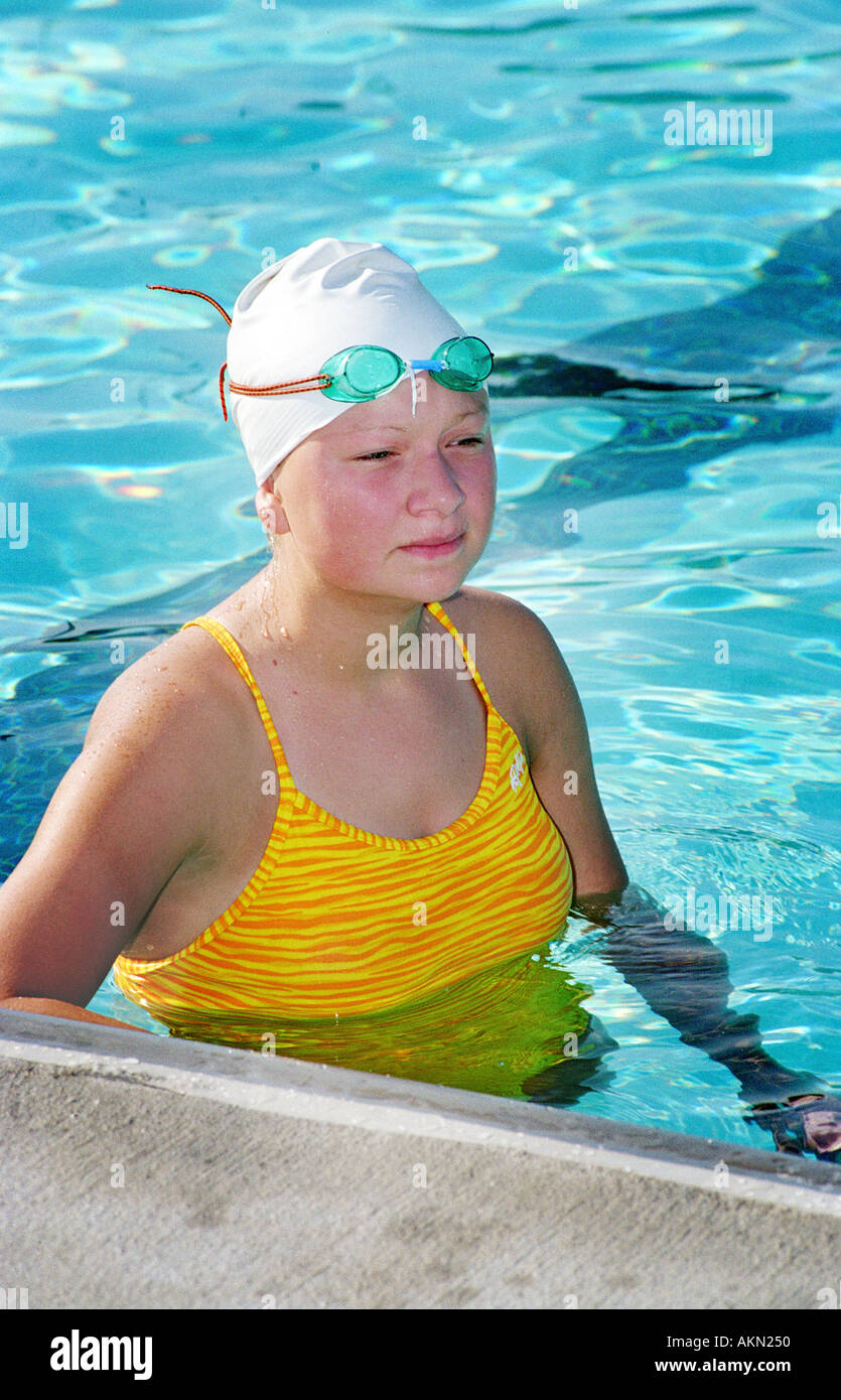 High school swimming meet includes male and female swim contestants