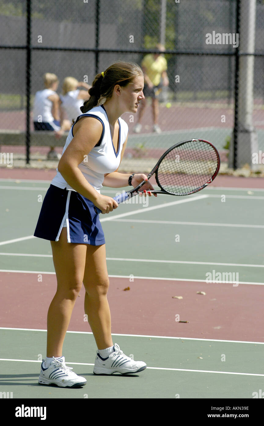 Female doubles match at a high school tennis meet Stock Photo Alamy