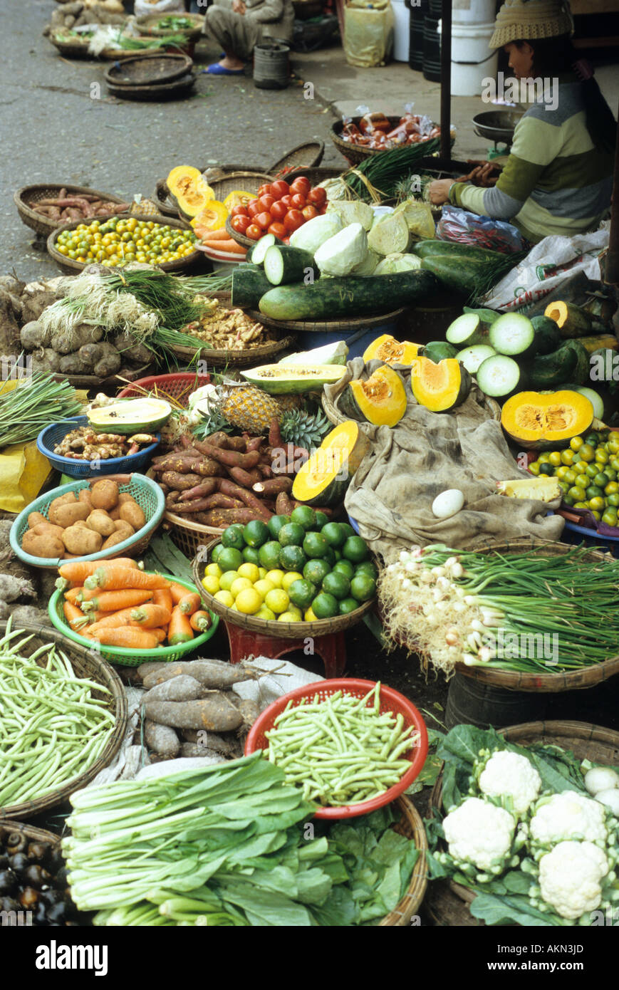 Baskets of fresh fruit and vegetables, Bach Dang St market, Hoi An, Viet Nam Stock Photo