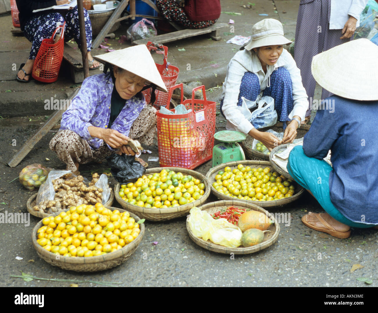 Baskets of fresh fruit for sale in the Bach Dang St market, Hoi An, Viet Nam Stock Photo