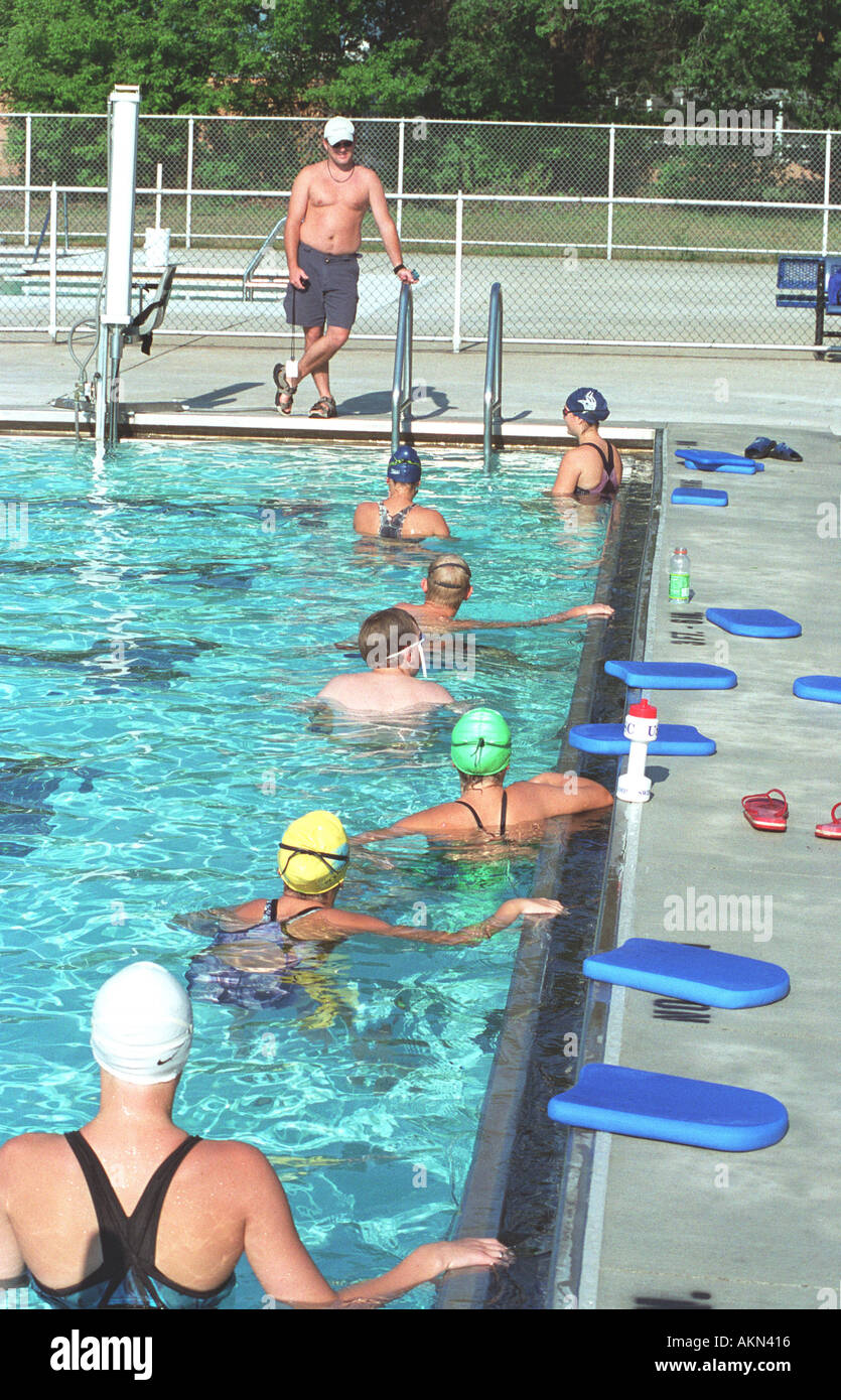 High school swimming meet includes male and female swim contestants