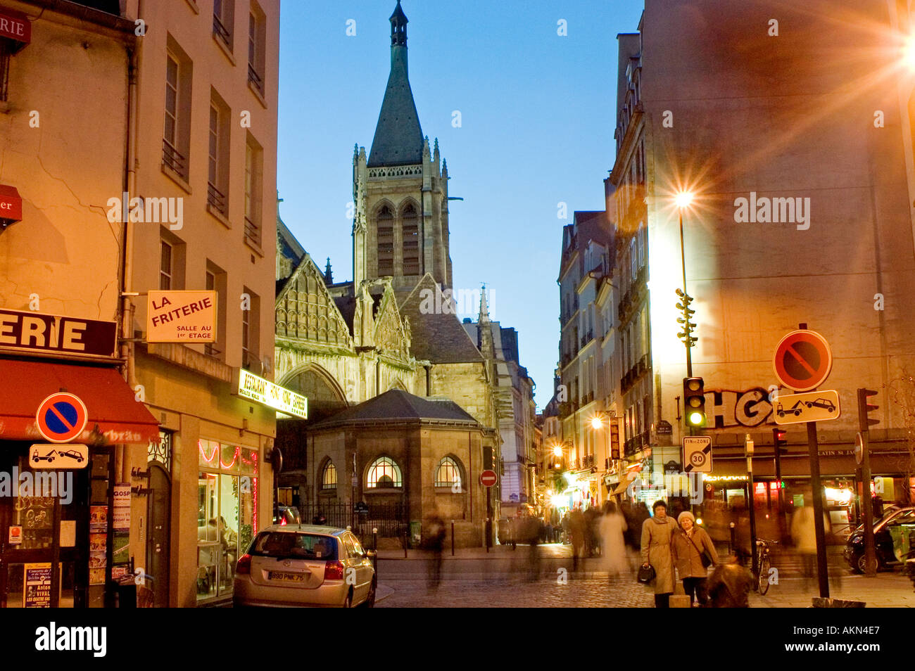 Paris France Religion 'Eglise Saint Severin' Church Exterior 'Street Scene' 'Rue Galande' 'Latin Quarter' 'Lit Up' at Night, Paris street lamp Stock Photo