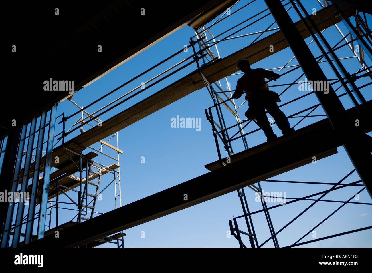 Construction worker on scaffolding Stock Photo